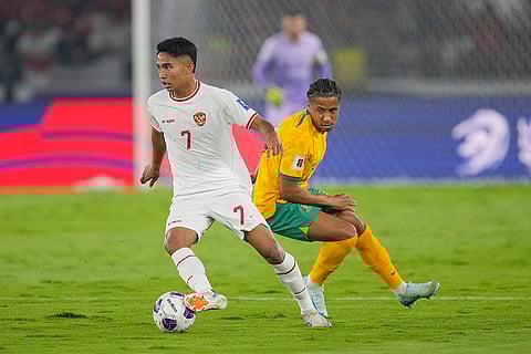 2026 FIFA World Cup Qualifying, Indonesia Australia: Indonesia's Marselino Ferdinan, left, battles for the ball with Australia's Samuel Silvera